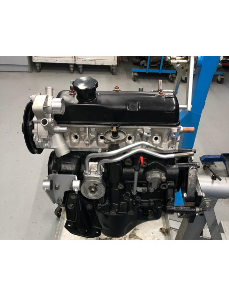 Reconstrucción de motor con rodaje y comprobación en banco.